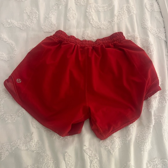 size 2 four inch red lululemon shorts, worn once. - Picture 1 of 3